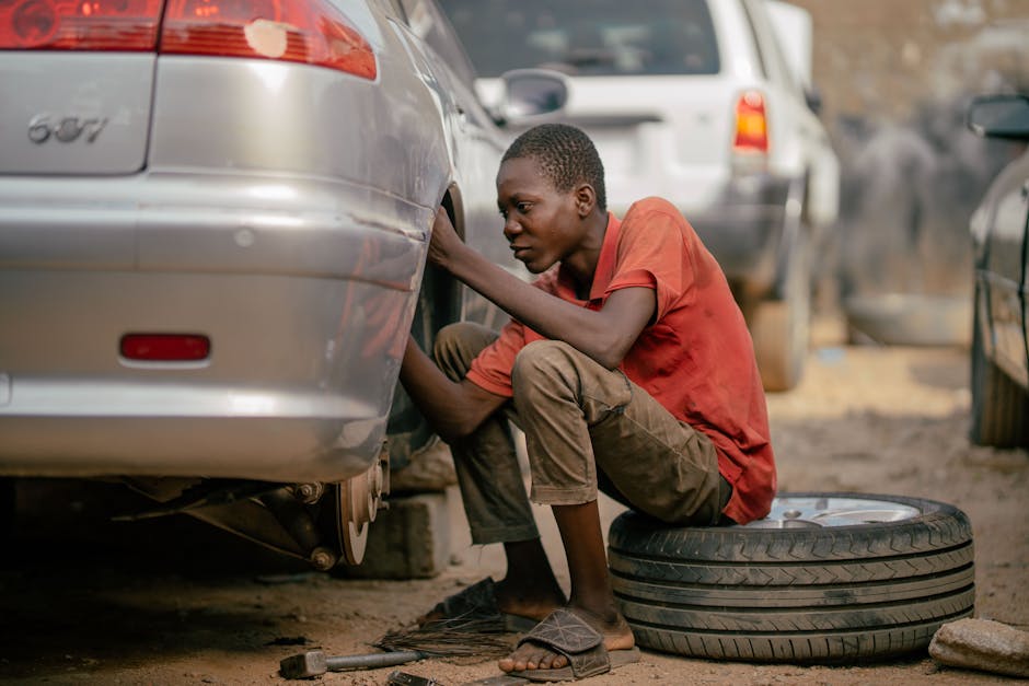 Mechanic changing a car tire